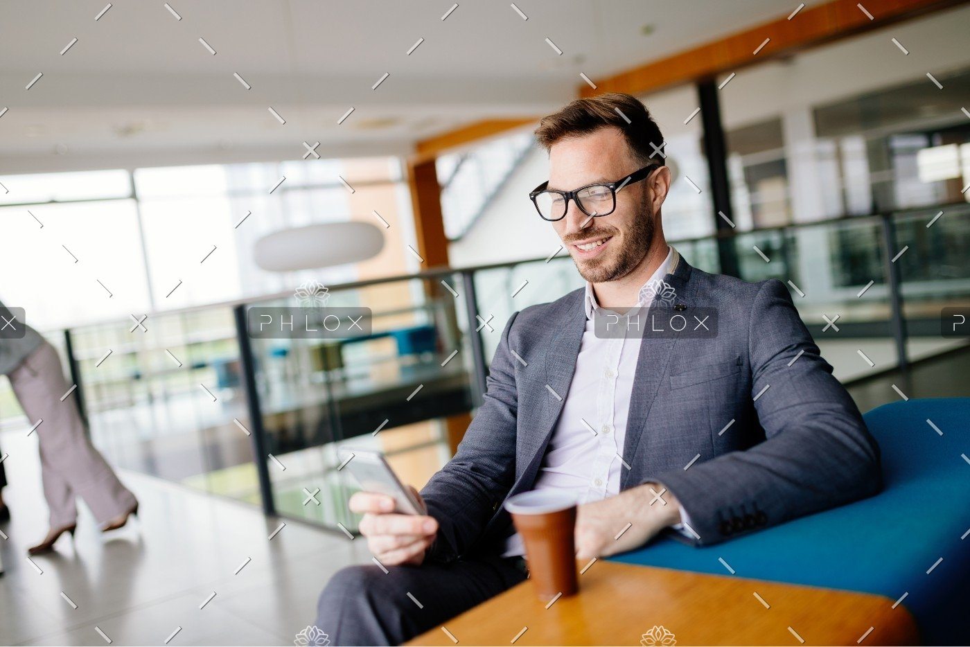 demo-attachment-1475-businessman-taking-a-break-with-a-cup-of-coffee-JW4B3DH